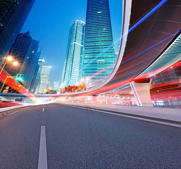 istock Asphalt road and modern city 513758309