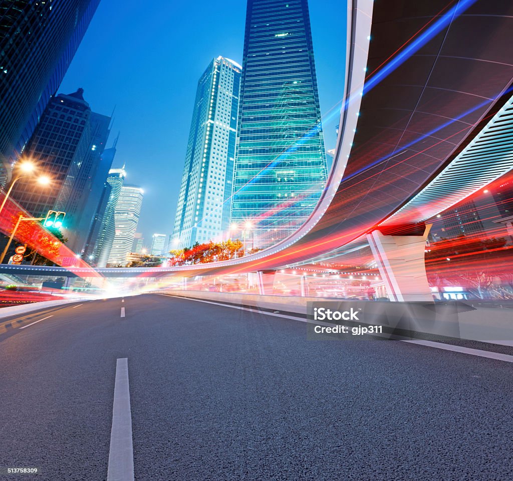 Asphalt road and modern city Architecture Stock Photo