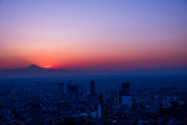 istock Mt. Fuji silhouette at dusk from Tokyo bay area 513758980