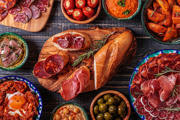 istock Typical spanish tapas concept, rustic style,  top view. 513760684
