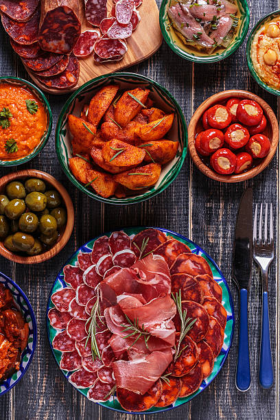 istock Typical spanish tapas concept, rustic style,  top view. 513760996