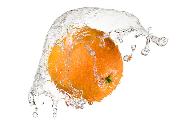 istock Red apple in splash of water 513761632