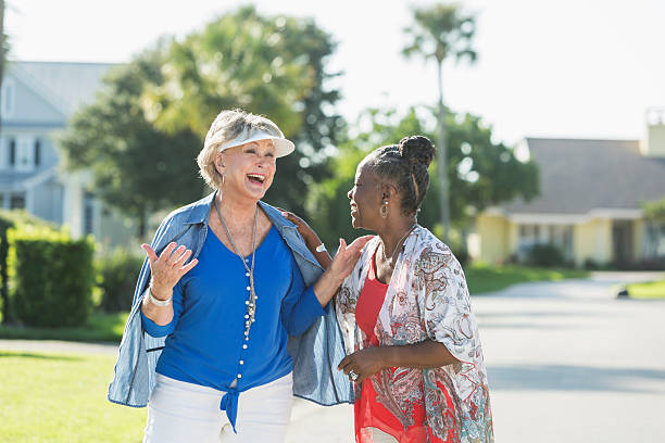 istock Senior women taking a walk on a sunny day, talking 513762438