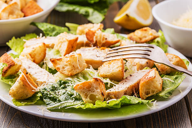 istock Homemade Chicken Caesar Salad with Cheese and Croutons. 513762872