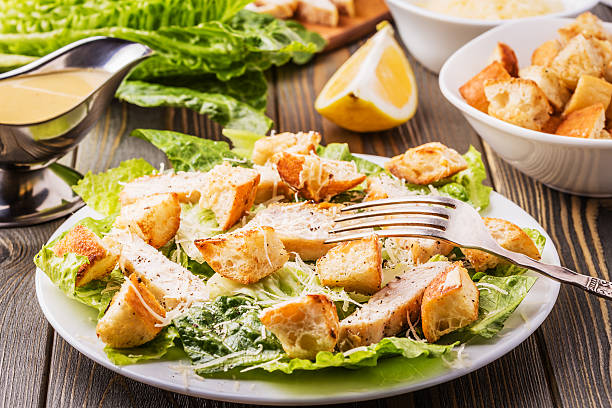 istock Homemade Chicken Caesar Salad with Cheese and Croutons. 513762908
