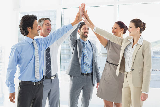 istock Employees celebrating a good job 513780893