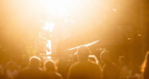 istock backlit of crowd on the city at dusk 513783069