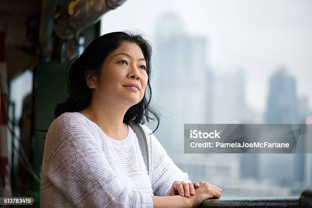 Mature Asian Woman Riding Ferry Stock Photo - Download Image Now - Women, One Woman Only, Asian and Indian Ethnicities
