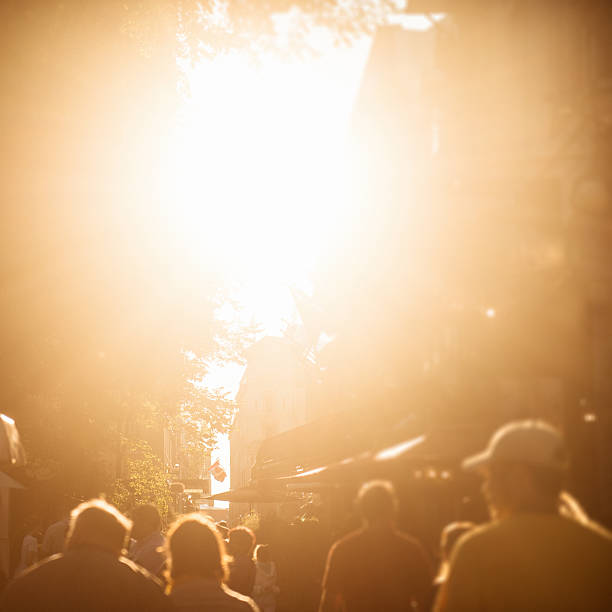 istock backlit of crowd on the city at dusk 513783935