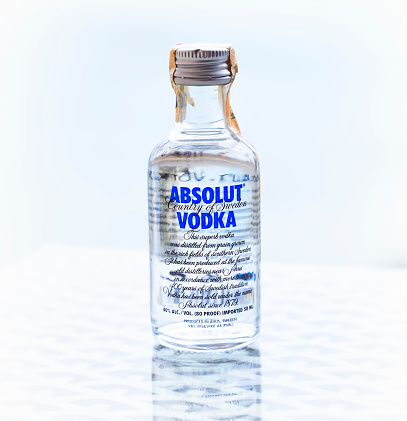 Istanbul, Turkey - April 30, 2014: An unopened bottle of Absolut produced near Åhus, Scania, in southern Sweden. Absolut is the third largest brand of alcoholic spirits in the world after Bacardi and Smirnoff, and is sold in 126 countries.