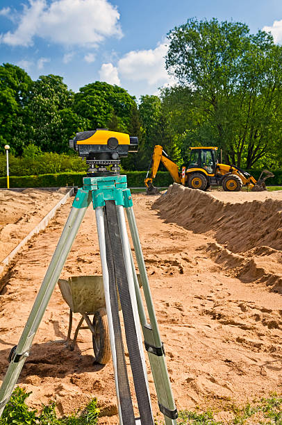 istock Landsurveyor equipment in road construction 513785579