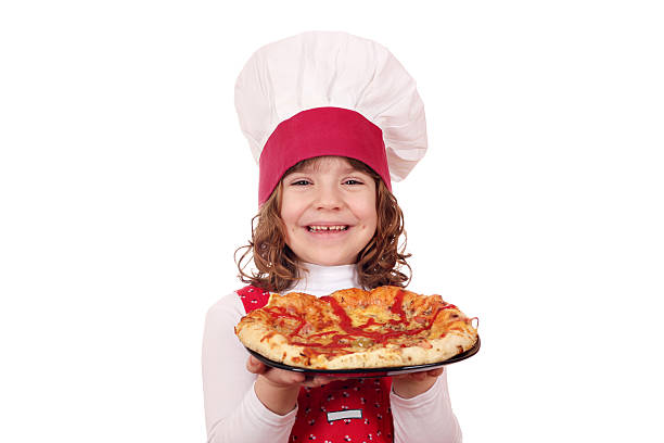istock happy little girl cook with pizza 513787241