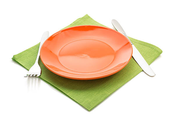 istock cloth napkin and plate on white 513791504