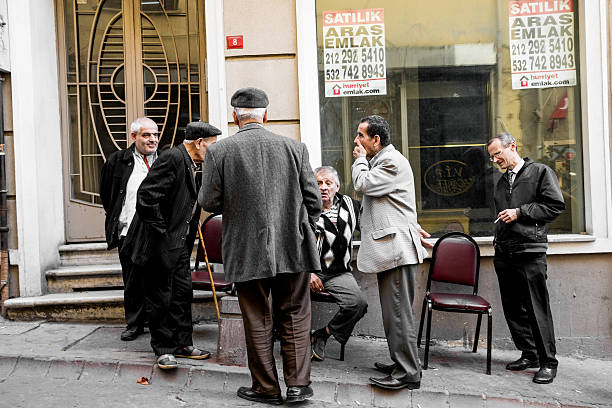 istanbul, Turkey - October 24, 2014Local Turkish men hanging out in Istanbul, Beyoglu district. Its a typical afternoon seen. Men are talking ja arguing.