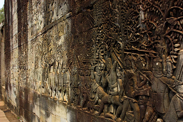 istock Bas Relief of Battle scene in Hindu Temple, Angkor Complex 513793516