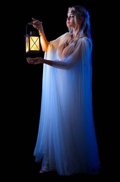 istock Young elven girl with lantern isolated 513794592