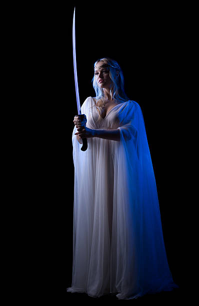 молодая девушка с меч изолированные elven - isolated glamour conflict action стоковые фото и изображения