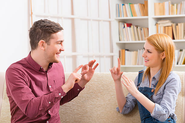 Sign Language Convo 4,700+ Sign Language Conversation Stock Photos, Pictures & Royalty-Free ...