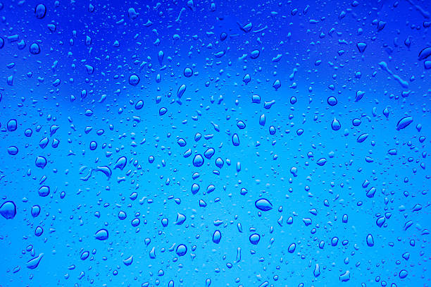 istock Blurred abstract background view of Rain drops on window surface 513798868