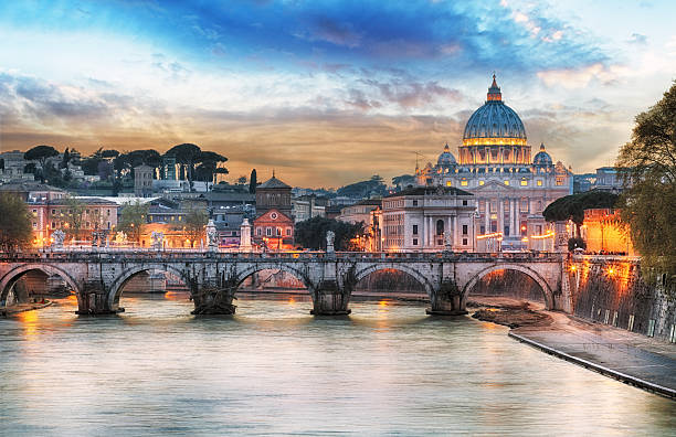 istock Tiber and St Peter Basilica in Vatican with rainbow, Rome 513799120