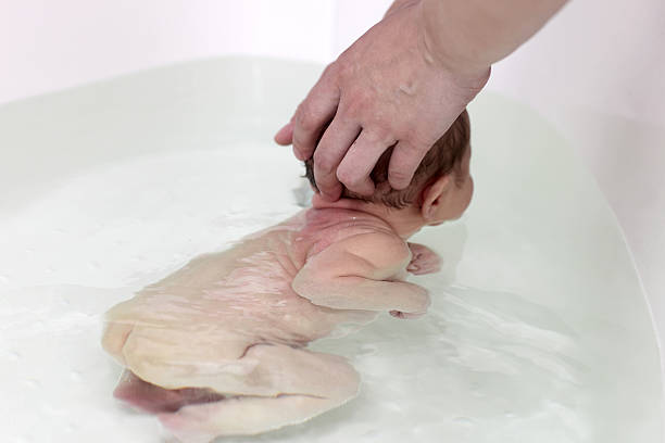 istock Baby swimming in the bath 513801314