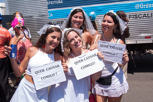 Rio de Janeiro, Brazil - February 8, 2016: Four young unidentified women dressed up as brides in street carnival block.