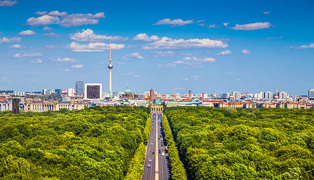 Berlin skyline with Tiergarten park in summer, Germany Aerial view of Berlin skyline panorama with Grosser Tiergarten public park on a sunny day with blue sky and clouds in summer, Germany. brandenburg gate photos stock pictures, royalty-free photos & images