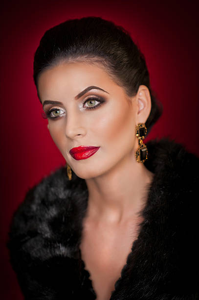 istock Gorgeous eyes brunette lady with black fur collar 513802786