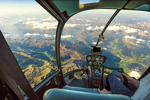 istock Helicopter on mountain landscape 513807558