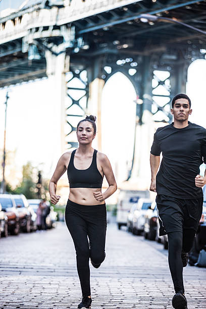 istock Urban runners running in DUMBO - New York streets 513809774