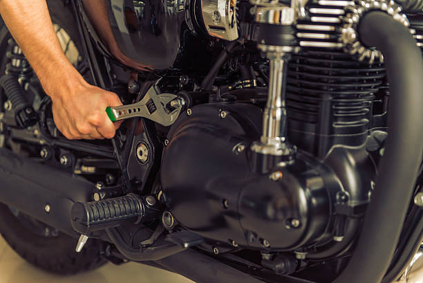 istock Man with motorbike 513811764