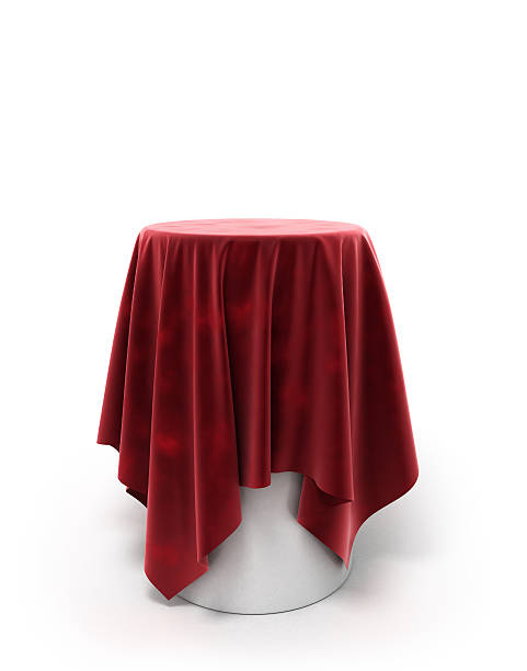 round red velor cloth on a round pedestal isolated stock photo