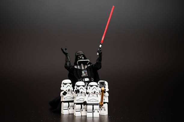 Group of Stormtroopers take a selfie with Darth Vader Orvieto, Italy - January 11, 2016: Group o Star Wars Lego Stormtroopers mini figures take a selfie with Darth Vader.  Lego is a popular line of construction toys manufactured by the Lego Group star wars stock pictures, royalty-free photos & images