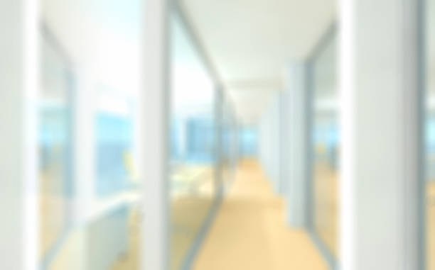 istock Defocused office space, corridor background with glass partitions 513821484