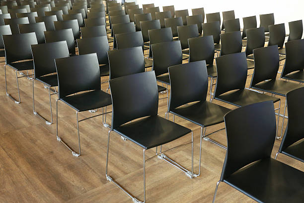 istock Interior of empty conference hall with gray colored chairs 513821872