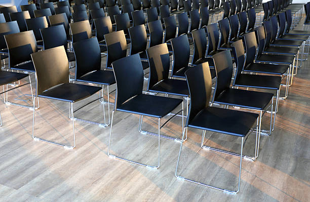 istock Interior of empty conference hall with gray colored chairs 513821982