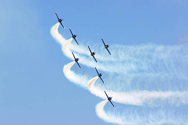 Jet aircraft flying in formation Miramar, San Diego, California,USA- October 3,2015. Breitling Jet Team flying in formation at 2015 Miramar Air Show in San Diego, California. The 2015 Miramar Air Show features 3 days of military aircraft flying for free to the general public. miramar air show stock pictures, royalty-free photos & images