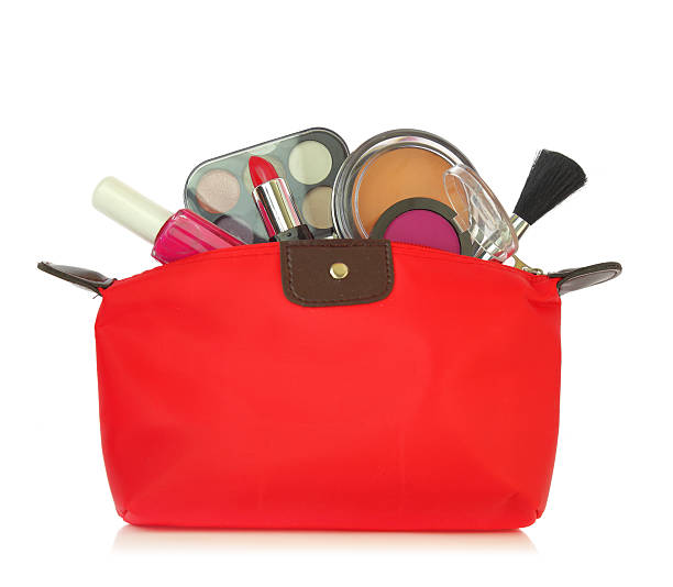 istock Various cosmetics in a red bag isolated on white 513822485