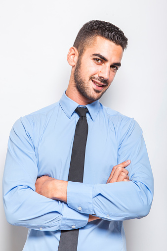 Single Elegant Man In Blue Shirt With Black Tie Stock Photo - Download  Image Now - Adult, Adults Only, Arms Crossed - Istock