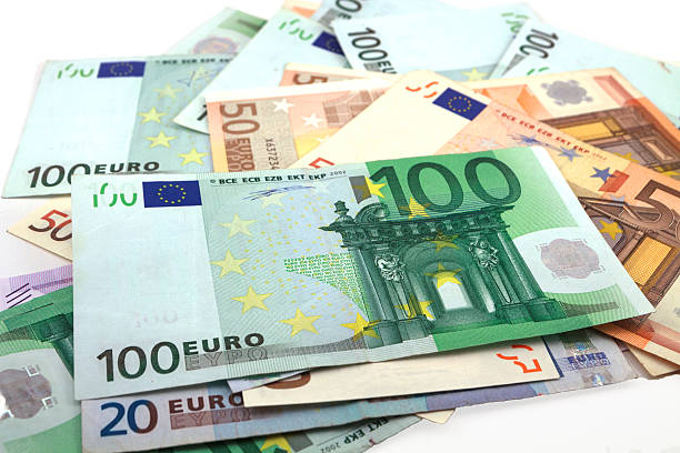 istock Euro paper on white background 513824759