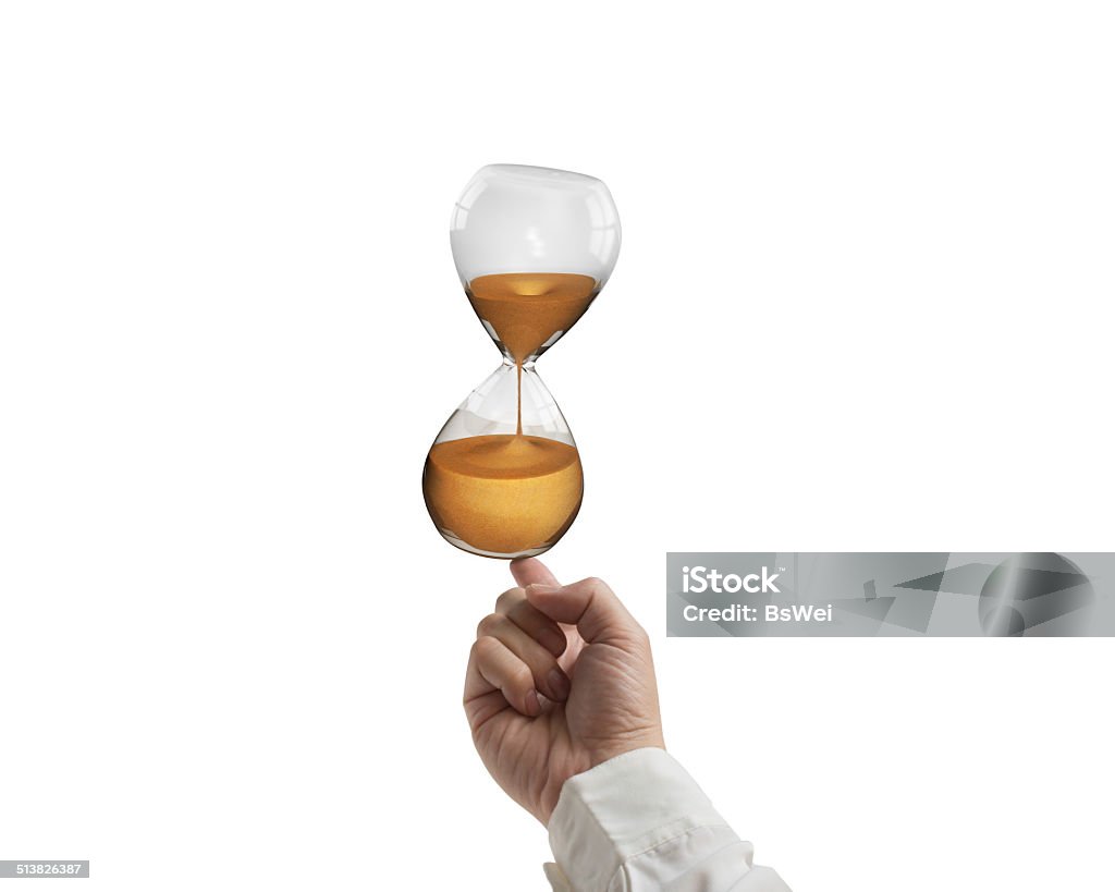 index finger balancing hourglass index finger balancing hourglass isolated on white Balance Stock Photo