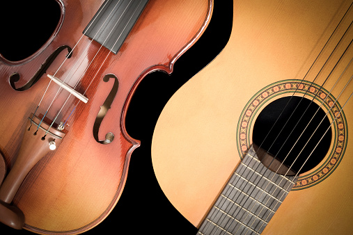 violin and acoustic guitar, isolated on black