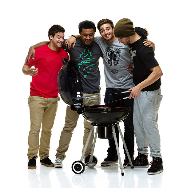 istock Social group of young men having a BBQ 513828785