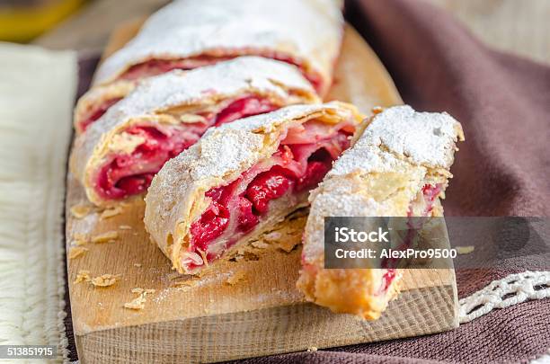 Cherry Strudel On The Wooden Board Stock Photo - Download Image Now - Austrian Culture, Baked, Baked Pastry Item