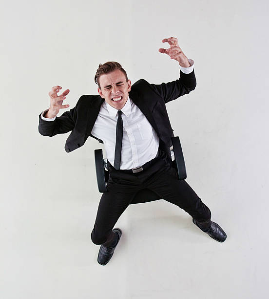istock Businessman sitting on chair stressed out 513851939