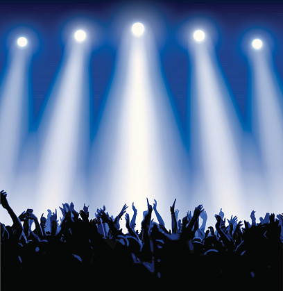 vector illustration of people on a rock concert raising hands