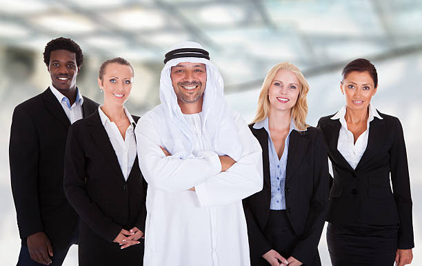istock Arabic Man Standing With Businesspeople 513854621