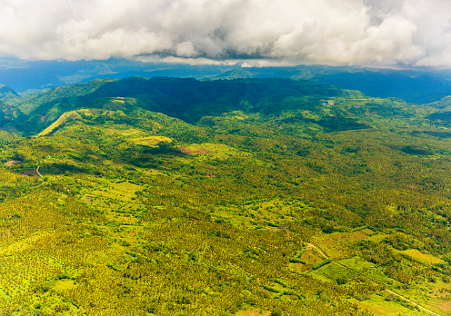 Top view of mountains and farmland in the tropics. Bukittinggi, Sumatra. Indonesia.