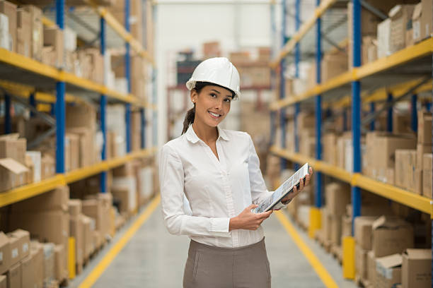 istock Business woman in a warehouse 513874702