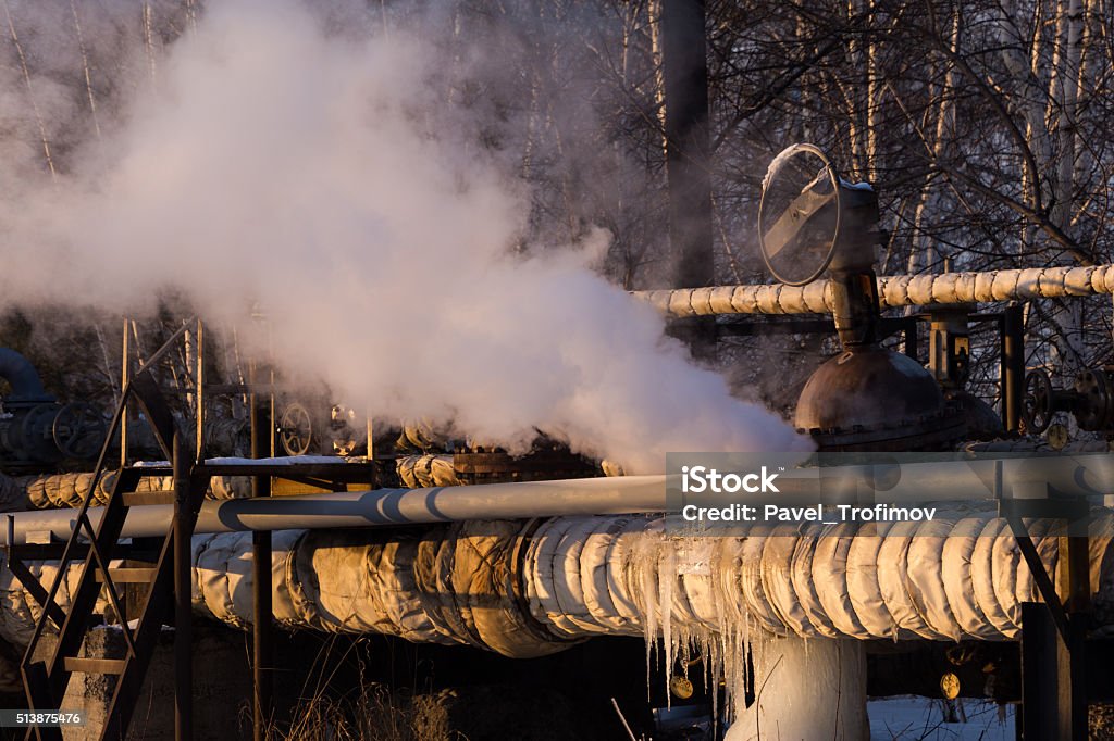 pipe breakage running hot water Repair broken old rusty pipes of the heating system in water Business Finance and Industry Stock Photo